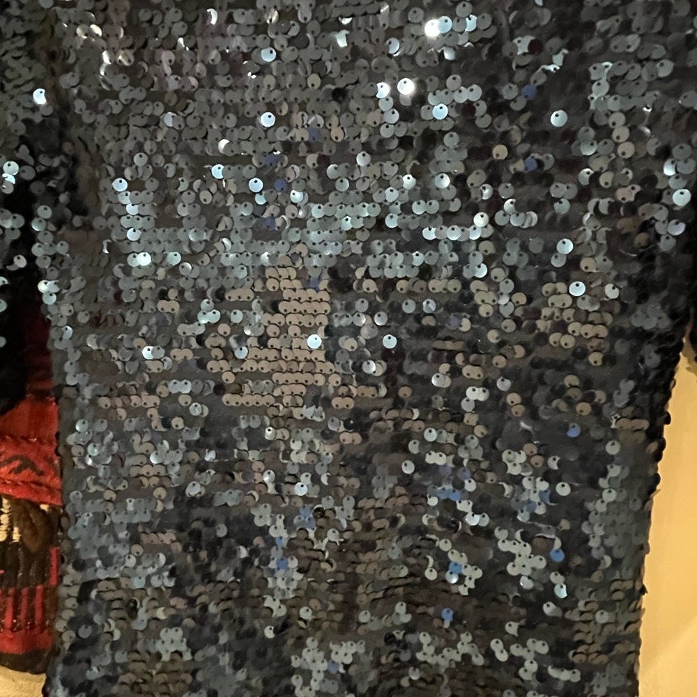 Gorgeous blue sequence dress. Comes to just above the knee on me (I’m 5’1”).